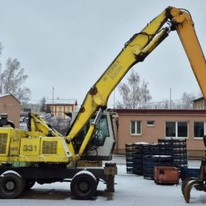 foto 22.5t překládací bagr Fuchs 331 kovošrot kolové rypadlo