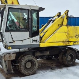 foto 22.5t překládací bagr Fuchs 331 kovošrot kolové rypadlo