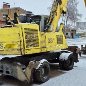 foto 22.5t překládací bagr Fuchs 331 kovošrot kolové rypadlo
